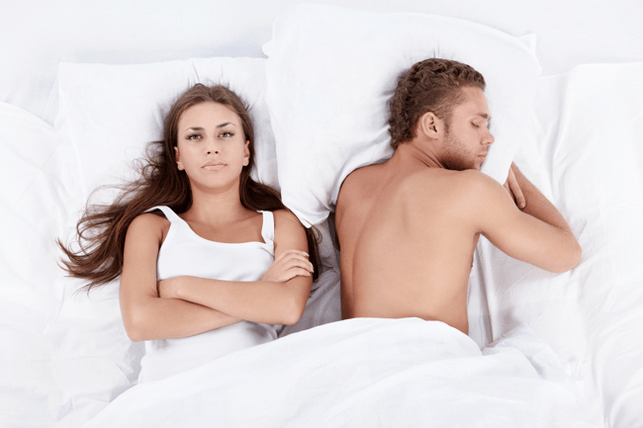 woman in bed with a man of low power